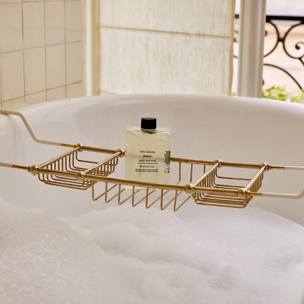 Junos Purify with perilla leaves beside the tub, herbal notes in view.
