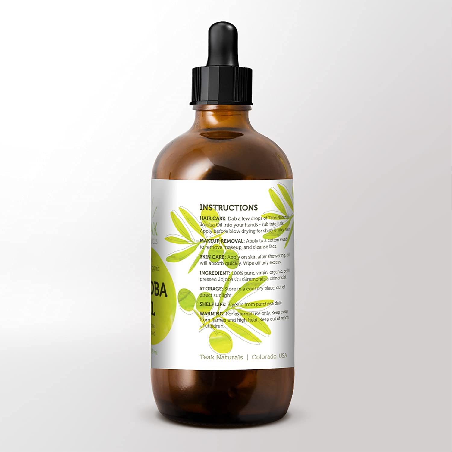 Teak Naturals Jojoba Oil on lips, provides gentle hydration.
