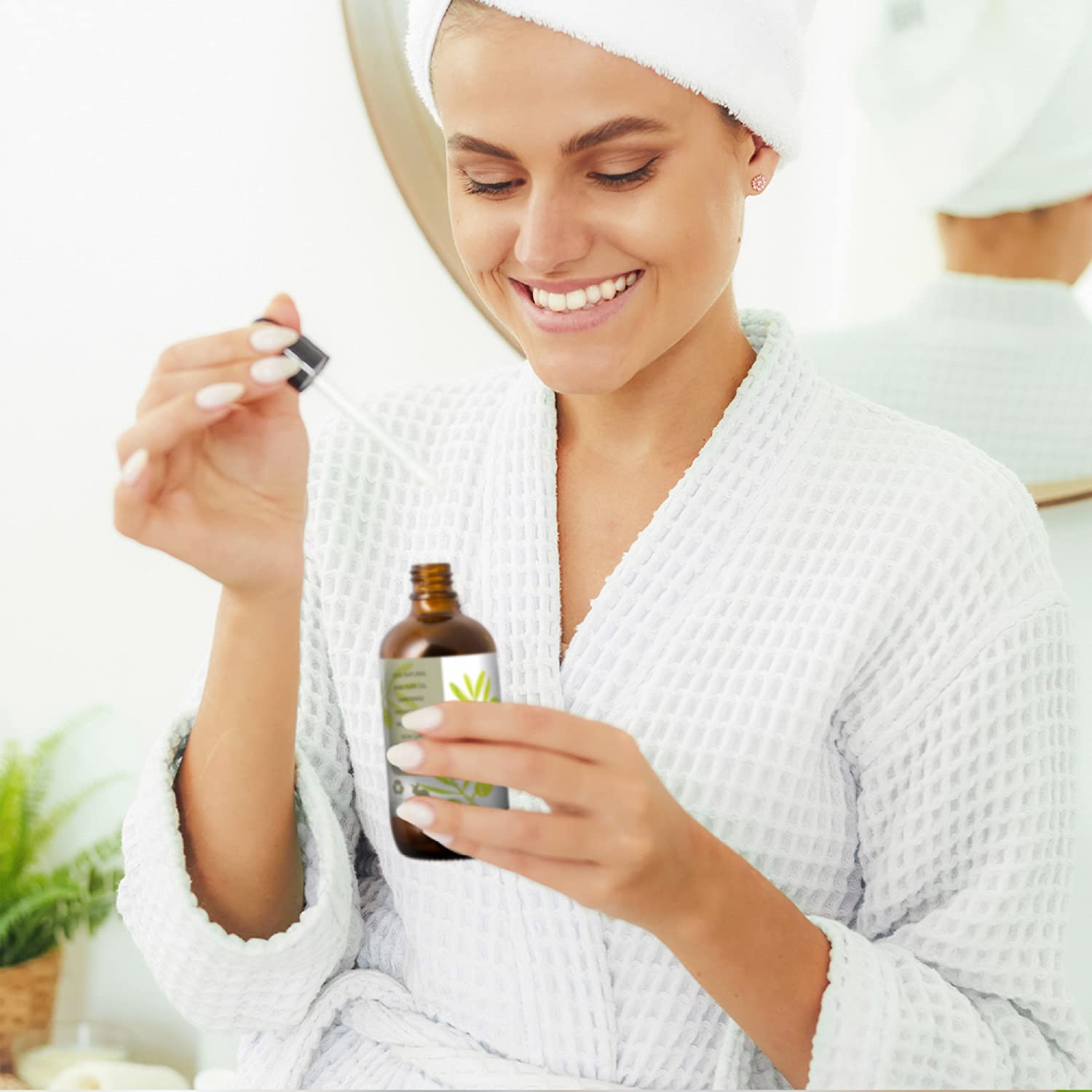 Teak Naturals Jojoba Oil pours, smooths hair and scalp.