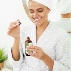 Teak Naturals Jojoba Oil pours, smooths hair and scalp.