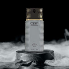 Ted Lapidus Lapidus EDT spray mist close-up for smooth, even application.