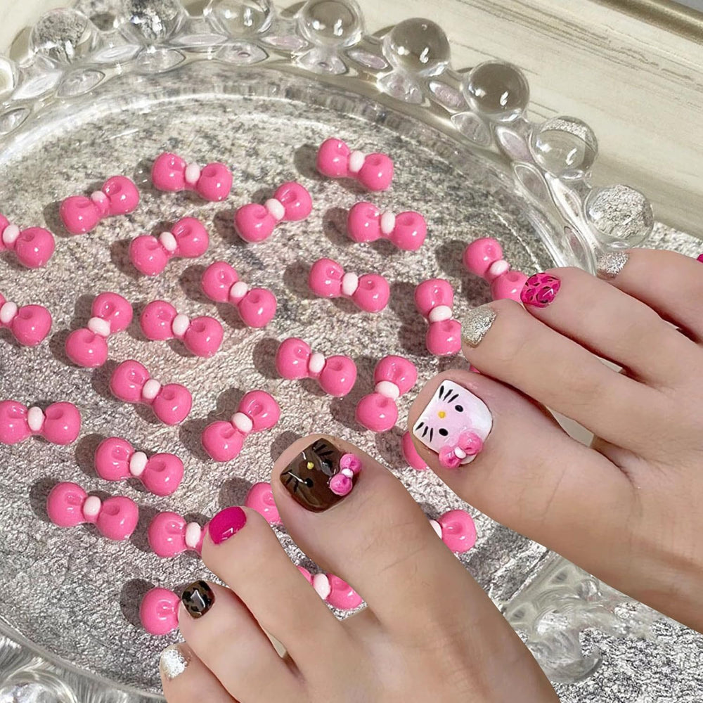 Temote cat bow nail art designs inspire playful DIY projects.