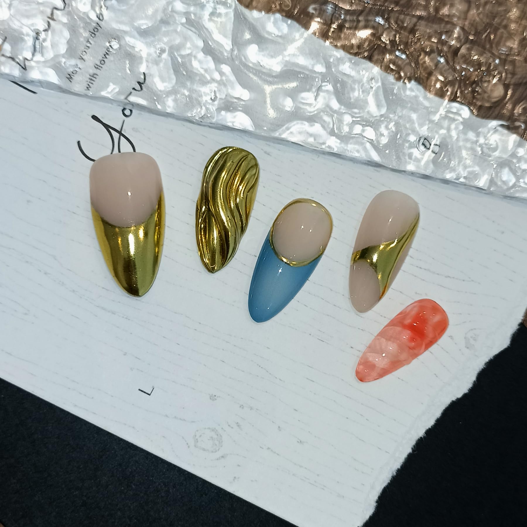 TENPAL almond-shaped nails with hand-forged design for a salon-worthy finish at home.