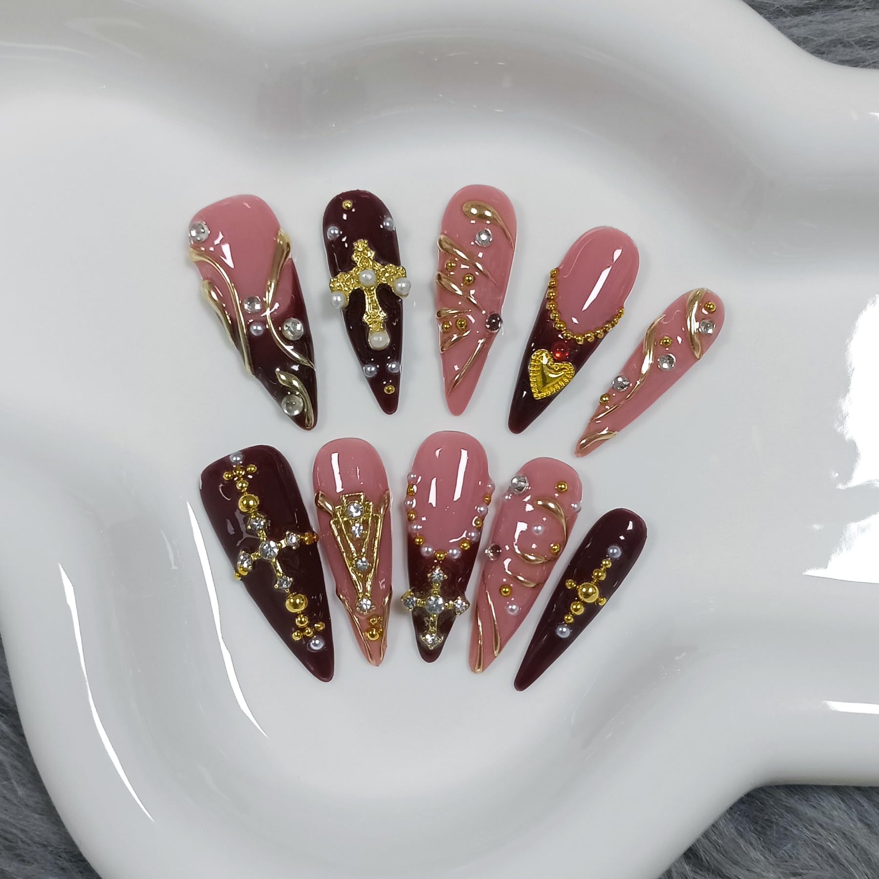 TENPAL close-up highlights 3D cross detail on red nails
