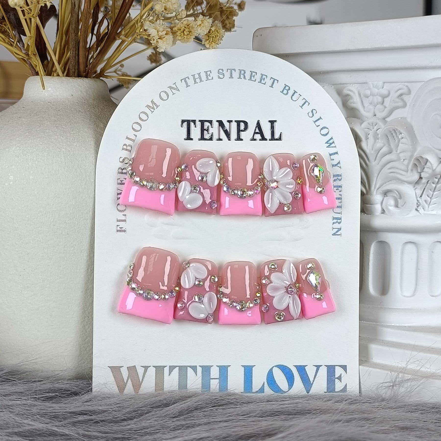 TENPAL duckbill nails with elegant French tip and gems for chic looks.