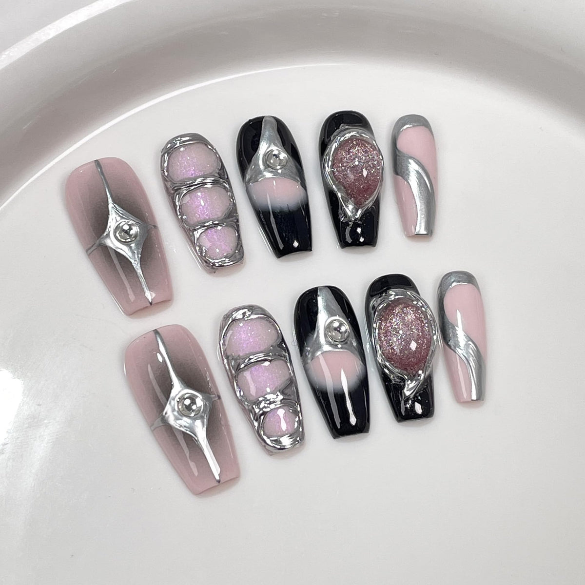 TENPAL coffin nails with crystal cat-eye design for a bold party look