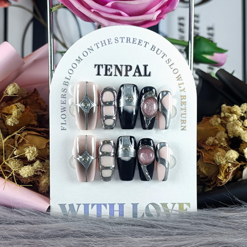 TENPAL pink and black galaxy nails offer edgy fashion flair.