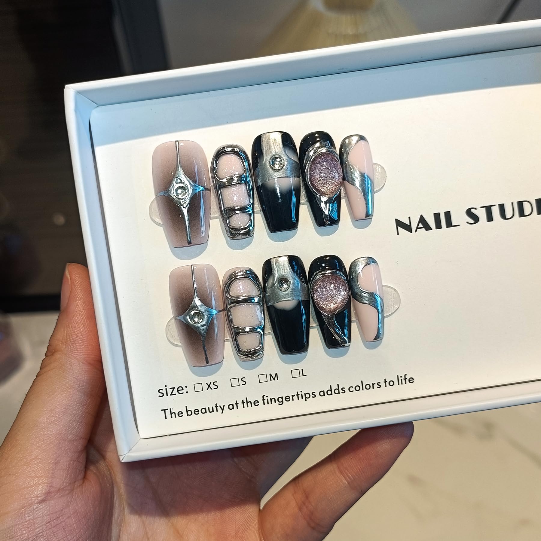 TENPAL Stiletto nails with subtle diamonds for glam evenings