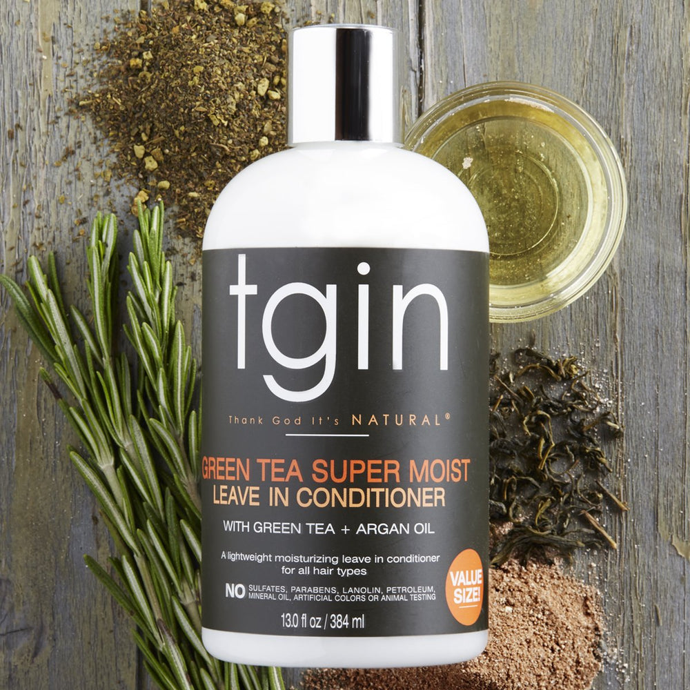 tgin Green Tea Leave-In applied to damp curls for detangling and smooth texture
