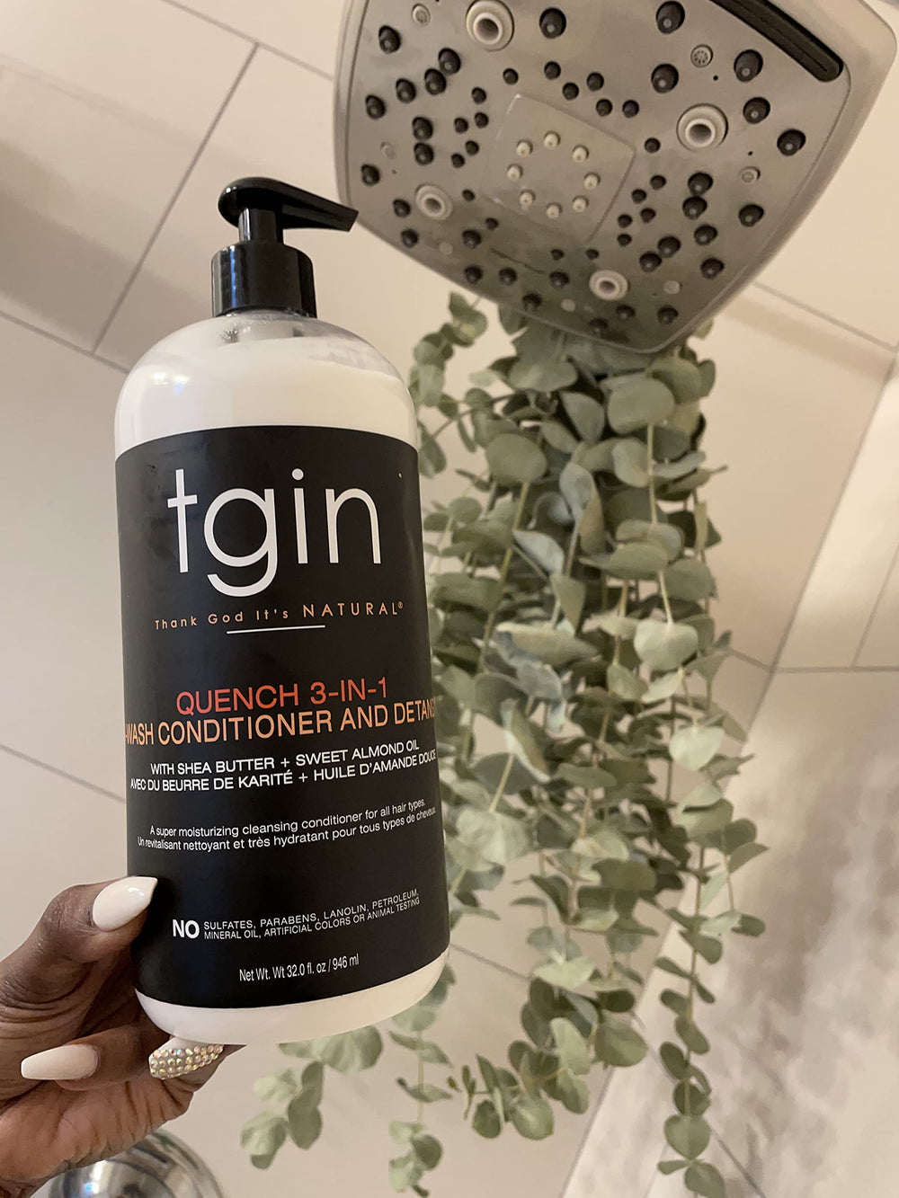 Thank God It's Natural display of natural ingredients like shea butter and almond oil
