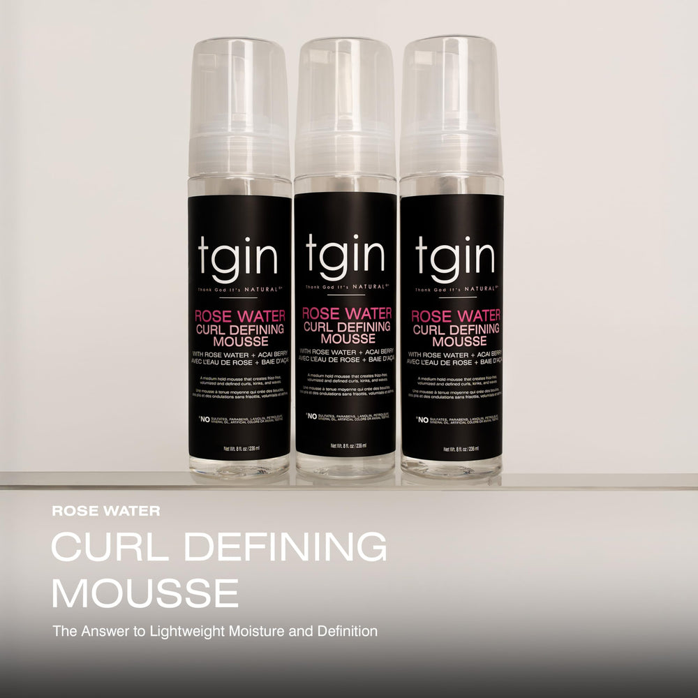 tgin Rose Water Curl Defining Mousse dispensing close-up demonstrating smooth application for manageable curls