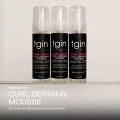 tgin Rose Water Curl Defining Mousse dispensing close-up demonstrating smooth application for manageable curls