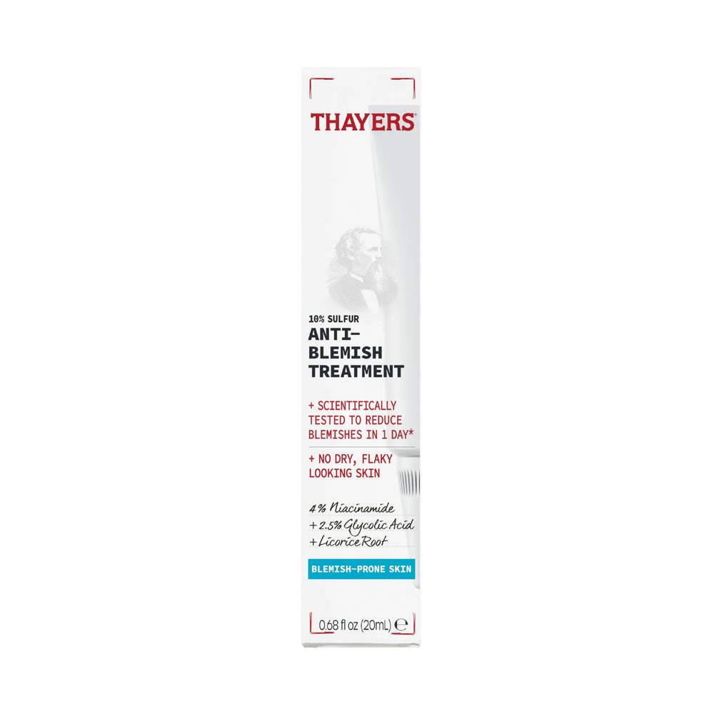 Applying THAYERS Rapid Acne Treatment to a blemish for targeted spot care.