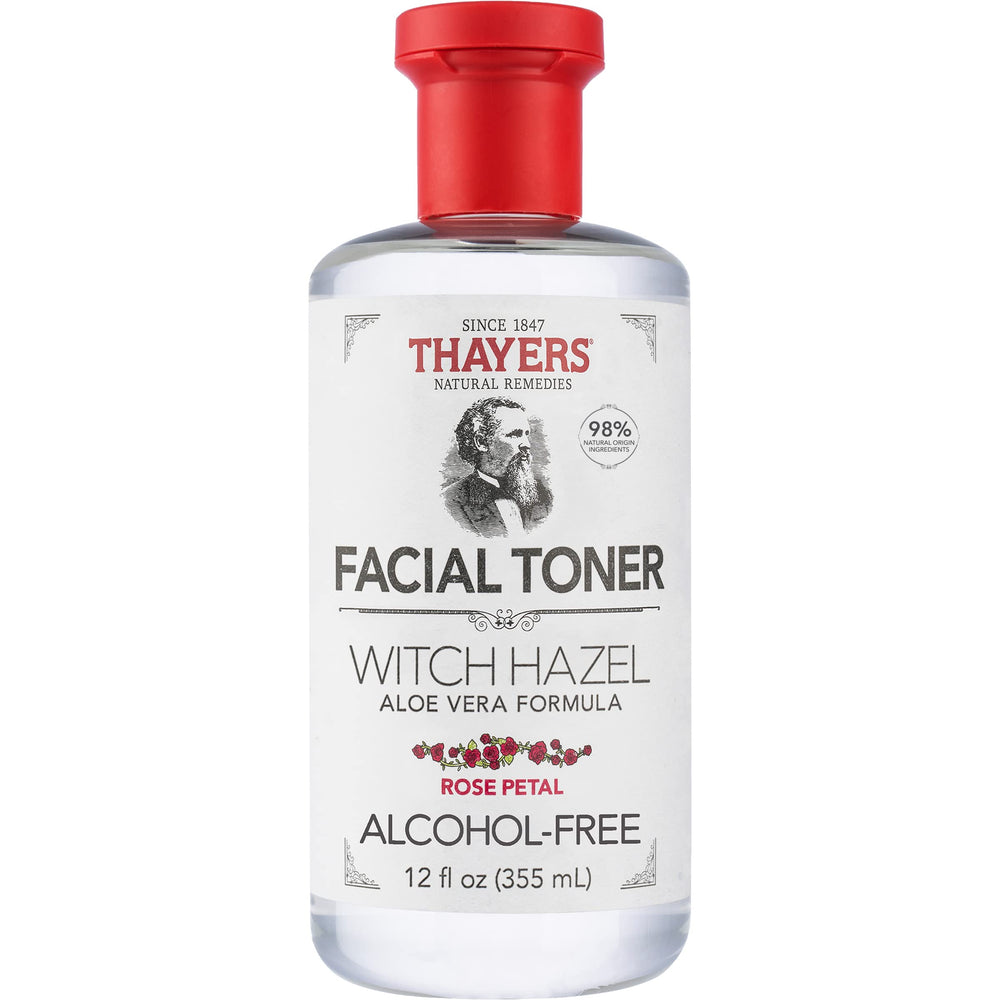THAYERS Witch Hazel non-distilled extract droplets on skin, balancing pores.