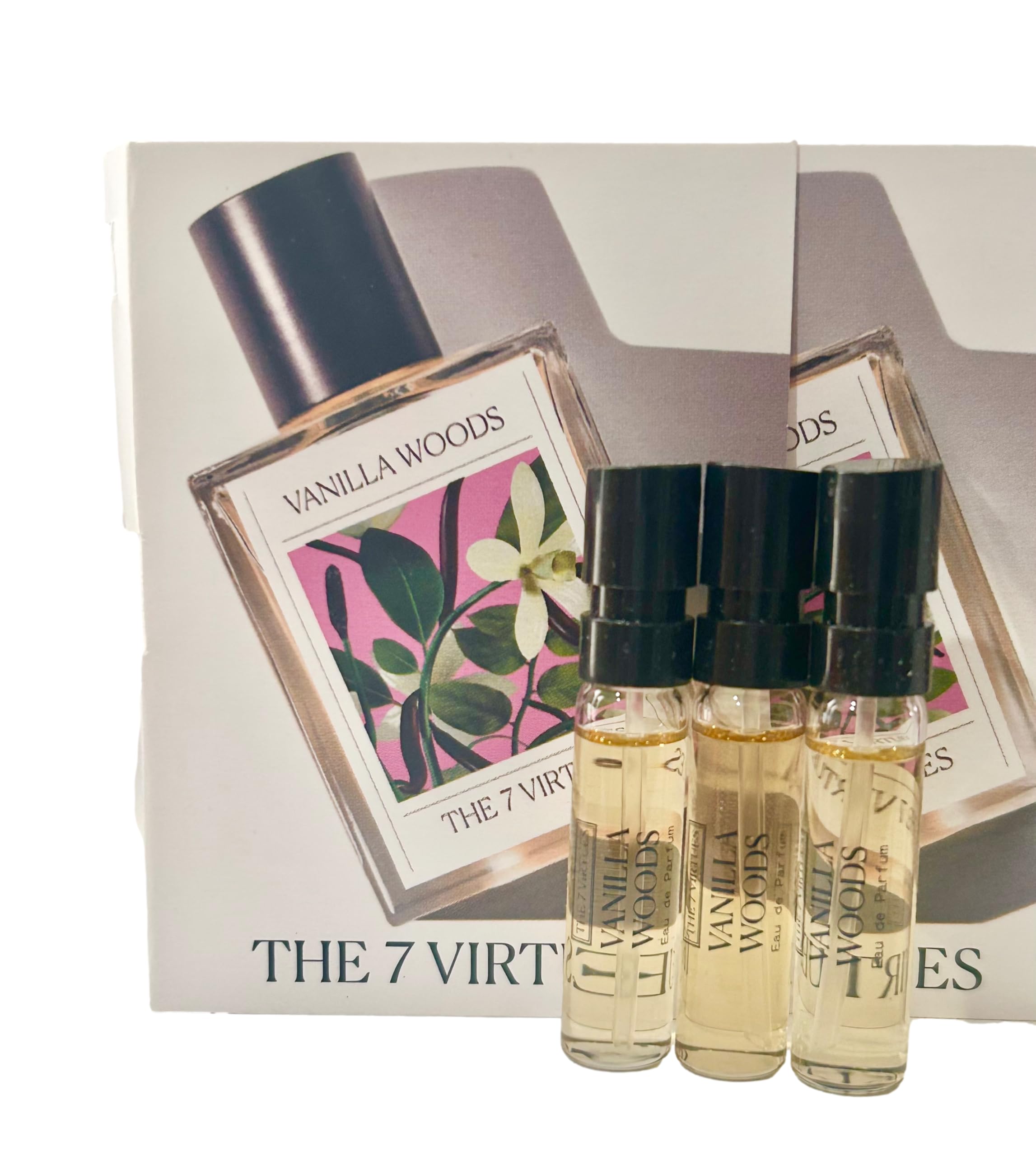The 7 Virtues Vanilla Woods perfume bottle, a trial size for daily wear.