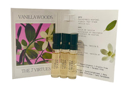 The 7 Virtues Vanilla Woods sample vial closeup for travel testing.