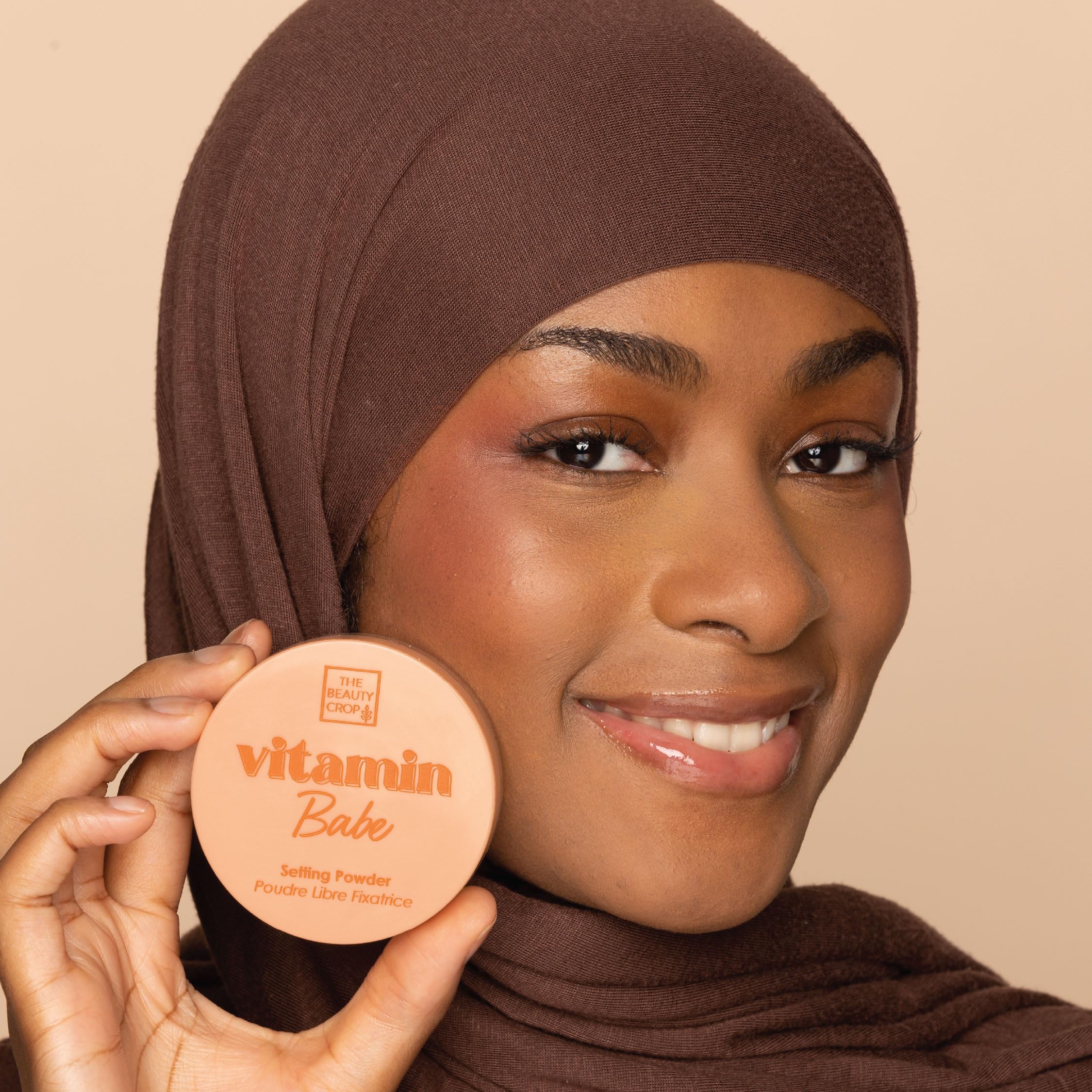 The Beauty Crop Vitamin Babe Setting Powder application demonstrates easy blending for natural looks.