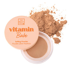 The Beauty Crop Vitamin Babe setting powder jar closeup showing smooth, airbrushed finish