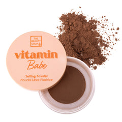 The Beauty Crop Vitamin Babe Setting Powder packaging with puff for quick touch-ups.