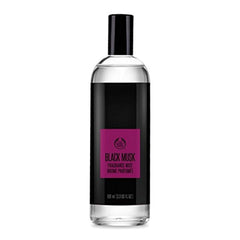 The Body Shop Black Musk fragrance mist bottle close-up for a long-lasting evening scent.