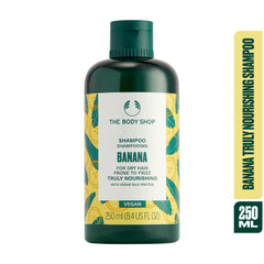 Creamy lather from The Body Shop Banana Shampoo on hair