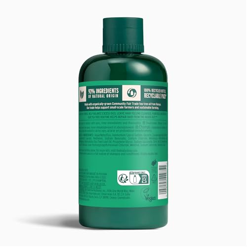 The Body Shop Tea Tree Purifying and Balancing Shampoo foaming lather on hair for oily scalp.