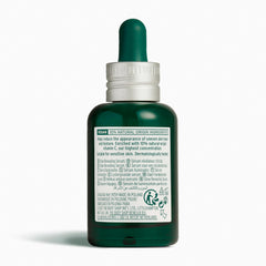 Dropper closeup shows lightweight formula for quick absorption and glow
