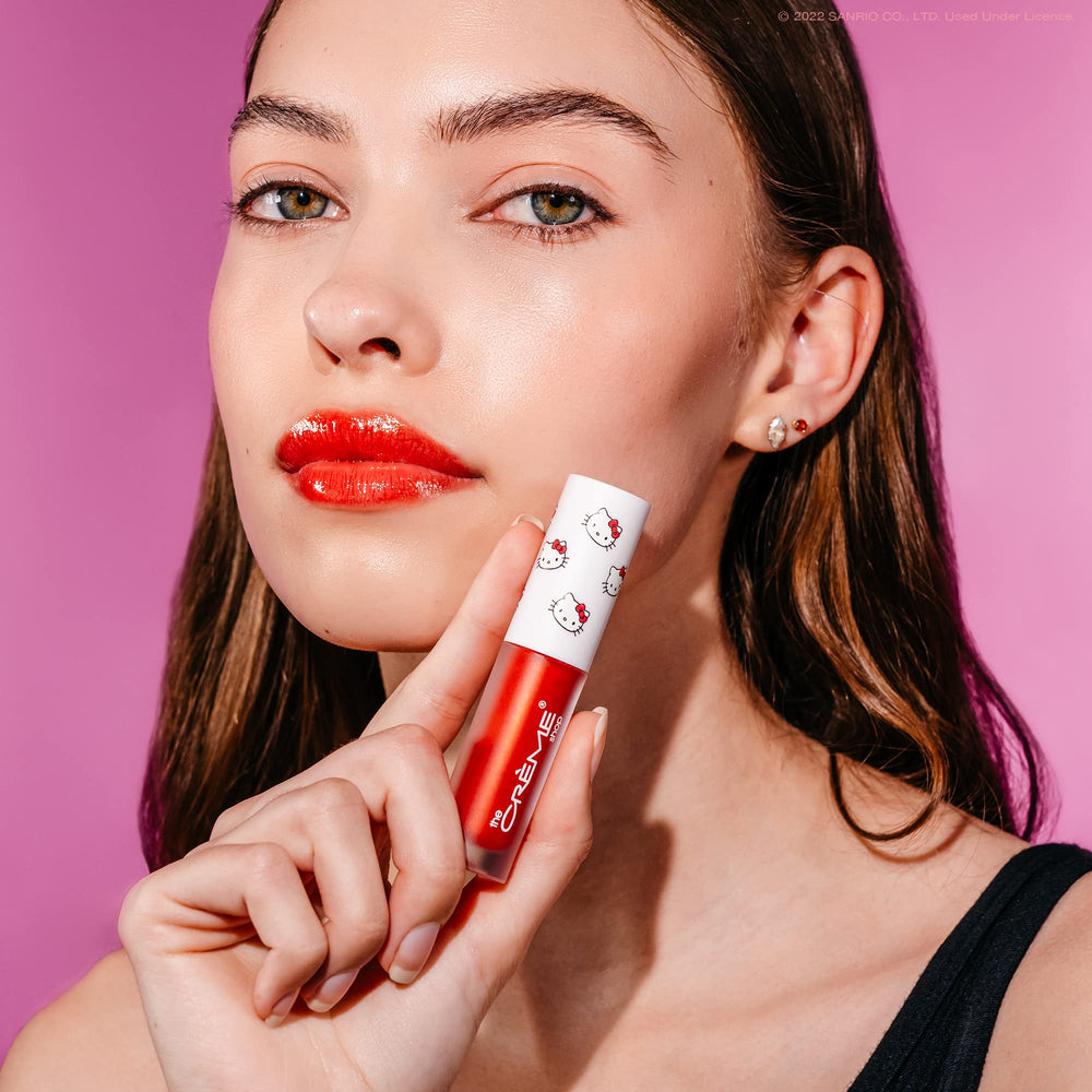 The Crème Shop Hello Kitty Kawaii Kiss Lip Oil apple hydration boost for dry lips.