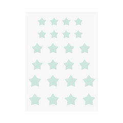 The Crème Shop star shape patches closeup showing absorbed impurities in hydrocolloid.