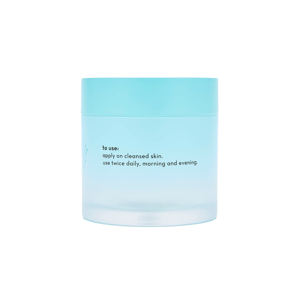 The Crème Shop Water 3000 hydrating crème swirl on finger highlights its light, refreshing hydration.