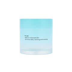 The Crème Shop Water 3000 hydrating crème swirl on finger highlights its light, refreshing hydration.