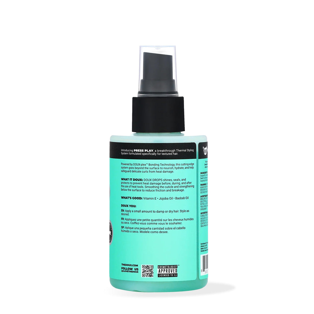The Doux Drops Bonding Polish Spray bottle closeup shows glossy shine and premium design