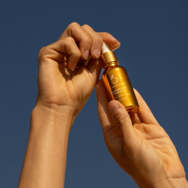 The Golden Secrets Youth Beauty Face Oil pump dispenser for easy, precise application