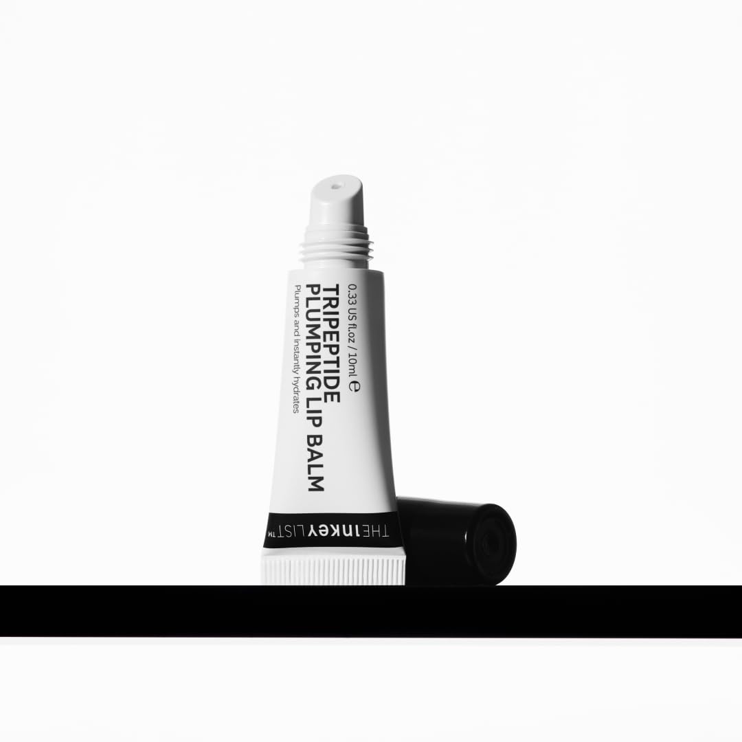 The INKEY List Tripeptide Plumping Lip Balm tube close-up, clear balm for hydrated lips