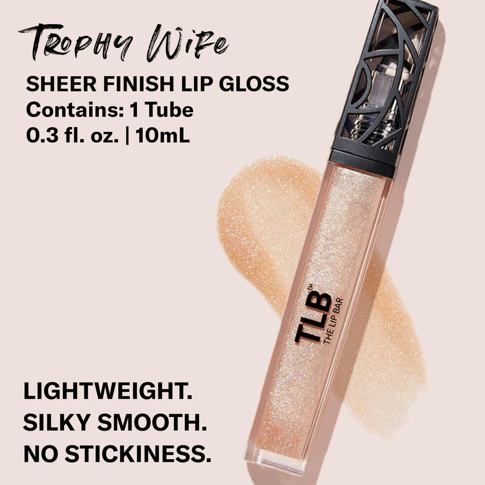 Swatches reveal a sheer color and radiant shine from Trophy Wife gloss.