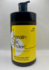 The Man Company Man with Flowers keratin silkprotein hair pack bottle closeup highlighting premium conditioning.