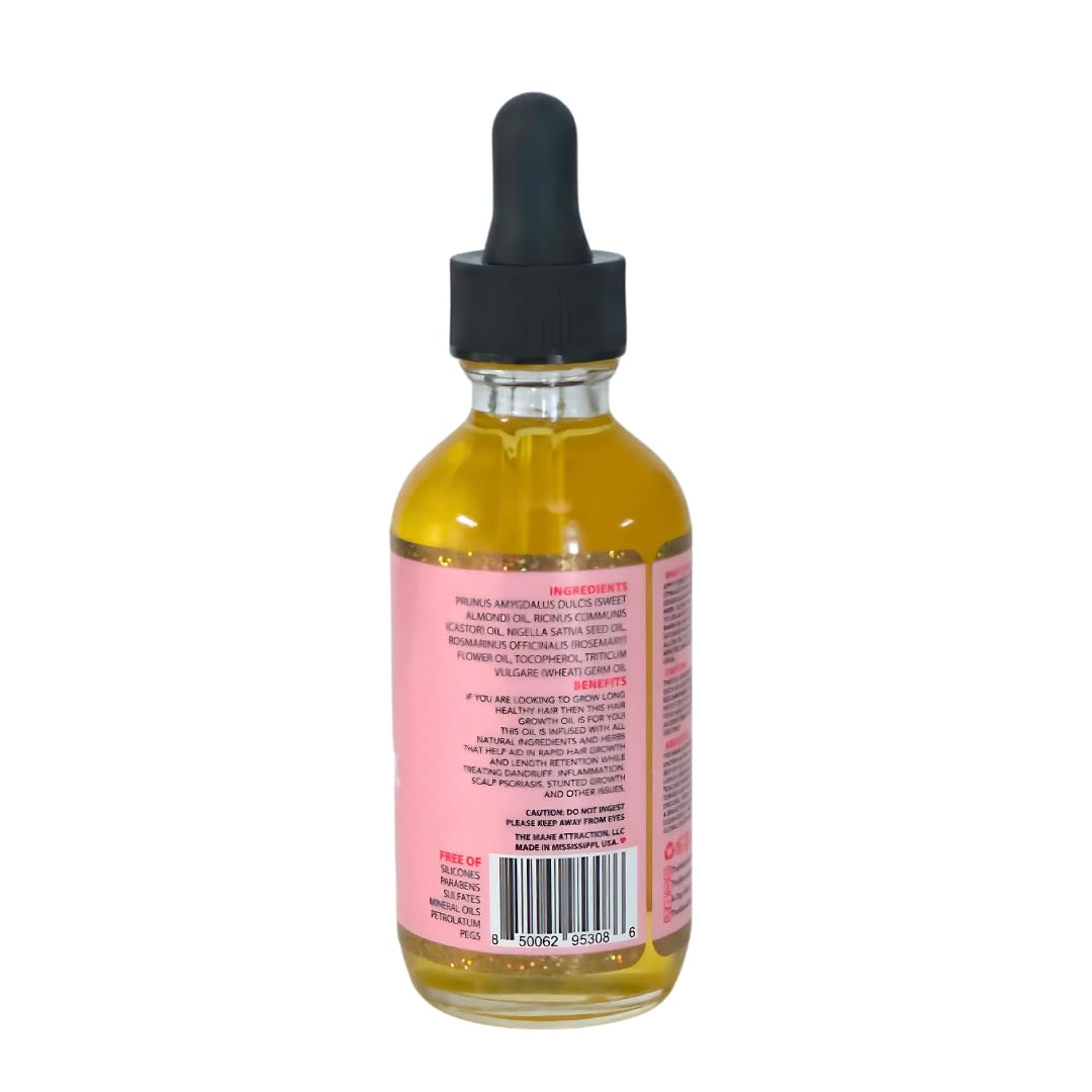 The Mane Attraction Hair Oil dropper pouring for quick absorption and light feel