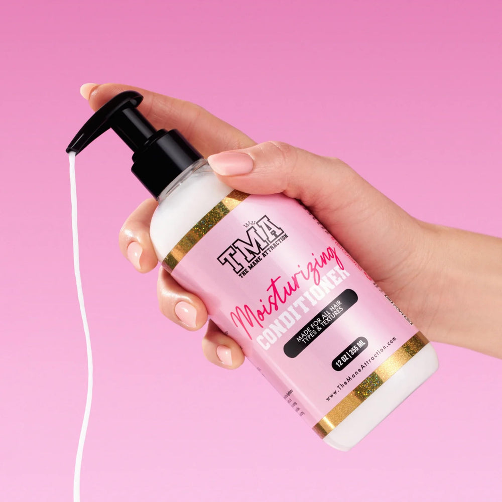 The Mane Attraction Moisturizing Conditioner bottle back displays ingredient list and nourishing formula