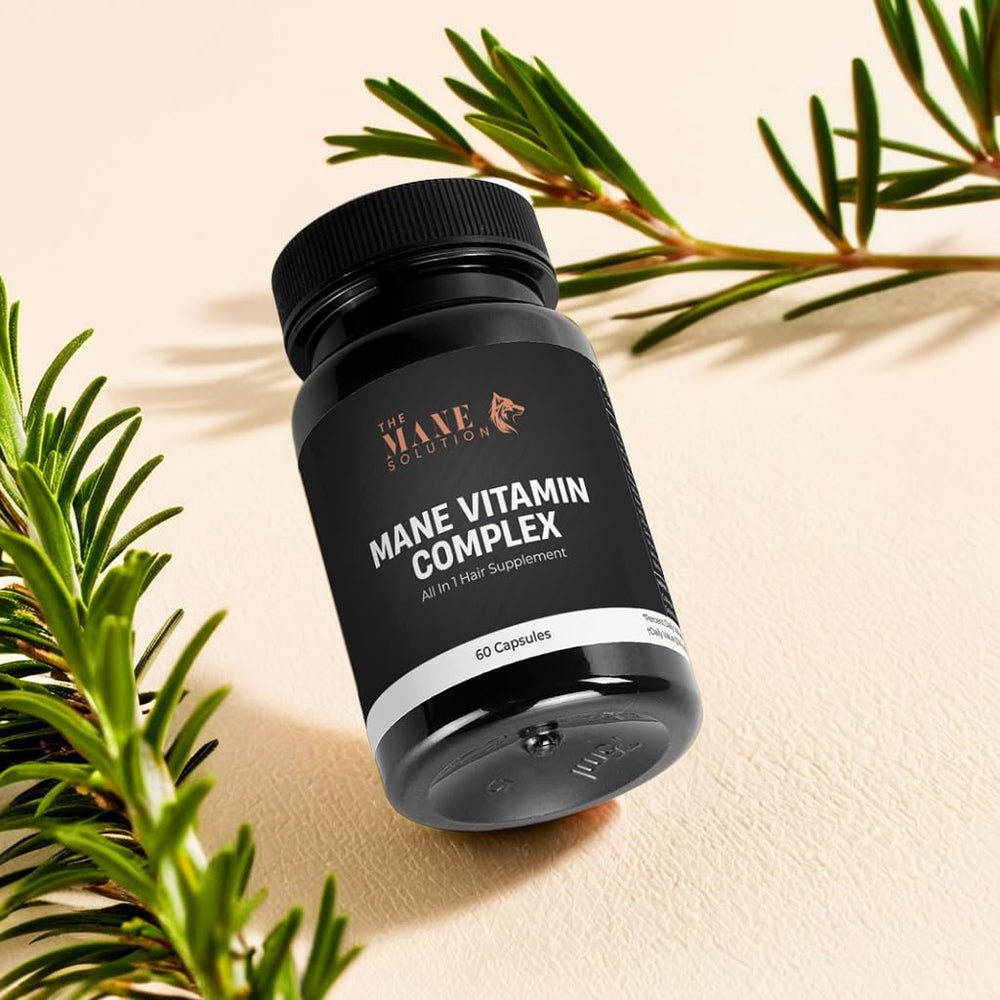 Capsules close-up of The Mane Solution Vitamin Complex supporting strong, healthy hair.