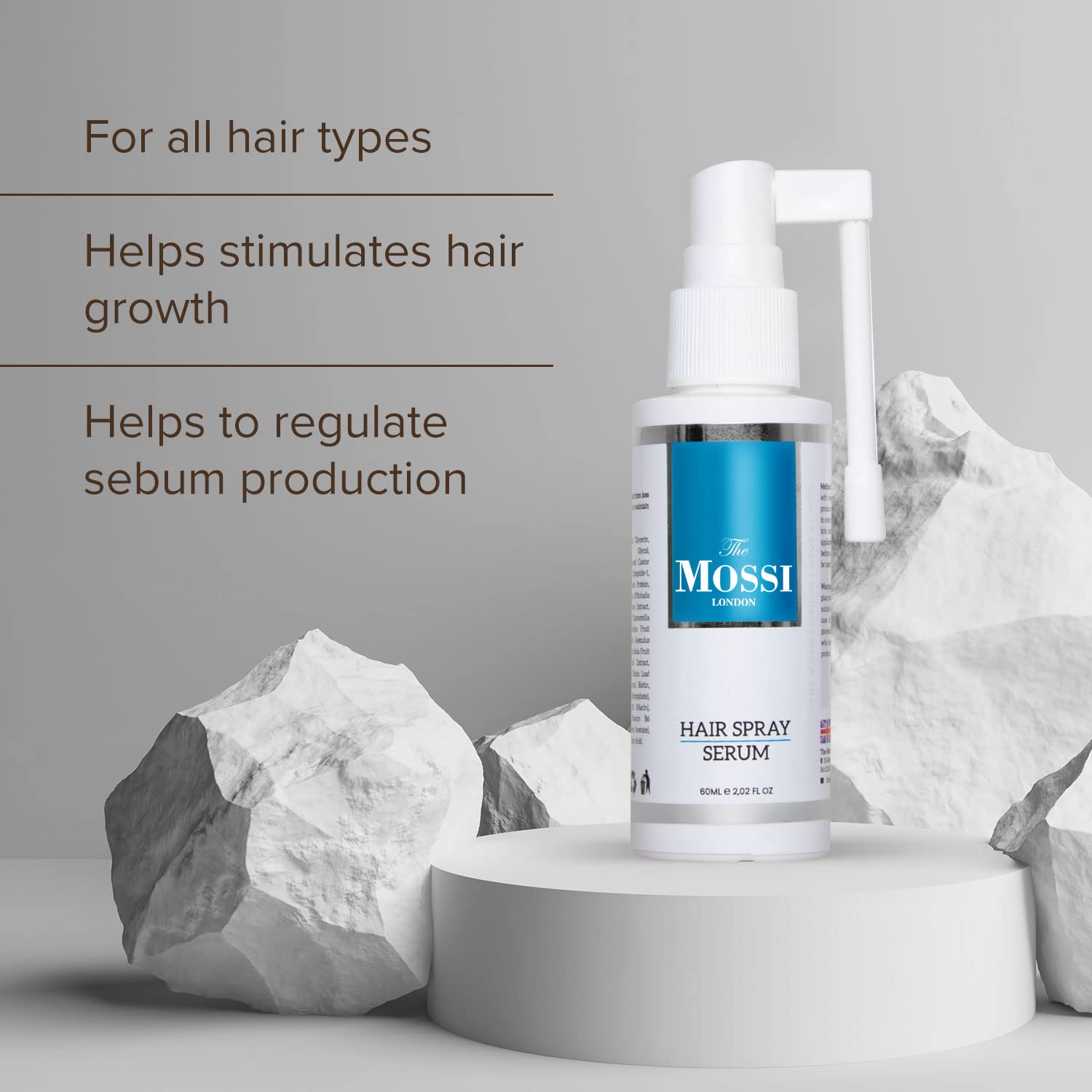 The Mossi London spray dispense-action shows a quick, even mist on hair.