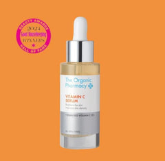 The Organic Pharmacy Stabilised Vitamin C Serum dropper in use for even skin tone