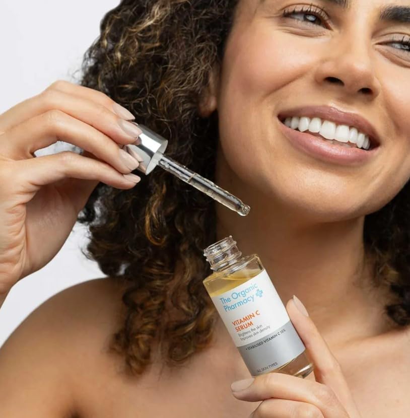 The Organic Pharmacy Stabilised Vitamin C Serum label and cap signaling premium brightening care