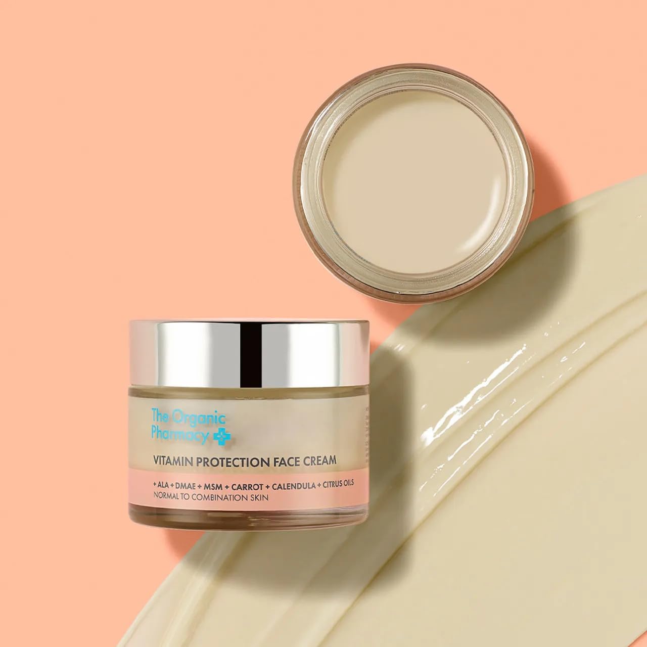 The Organic Pharmacy Vitamin Protection Face Cream packaging highlights UK-made, cruelty-free values