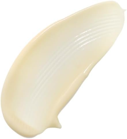 The Organic Pharmacy Vitamin Protection Face Cream texture close-up showing smooth finish