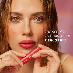 The Outset Lip Oasis cushiony applicator gliding smoothly on lips.