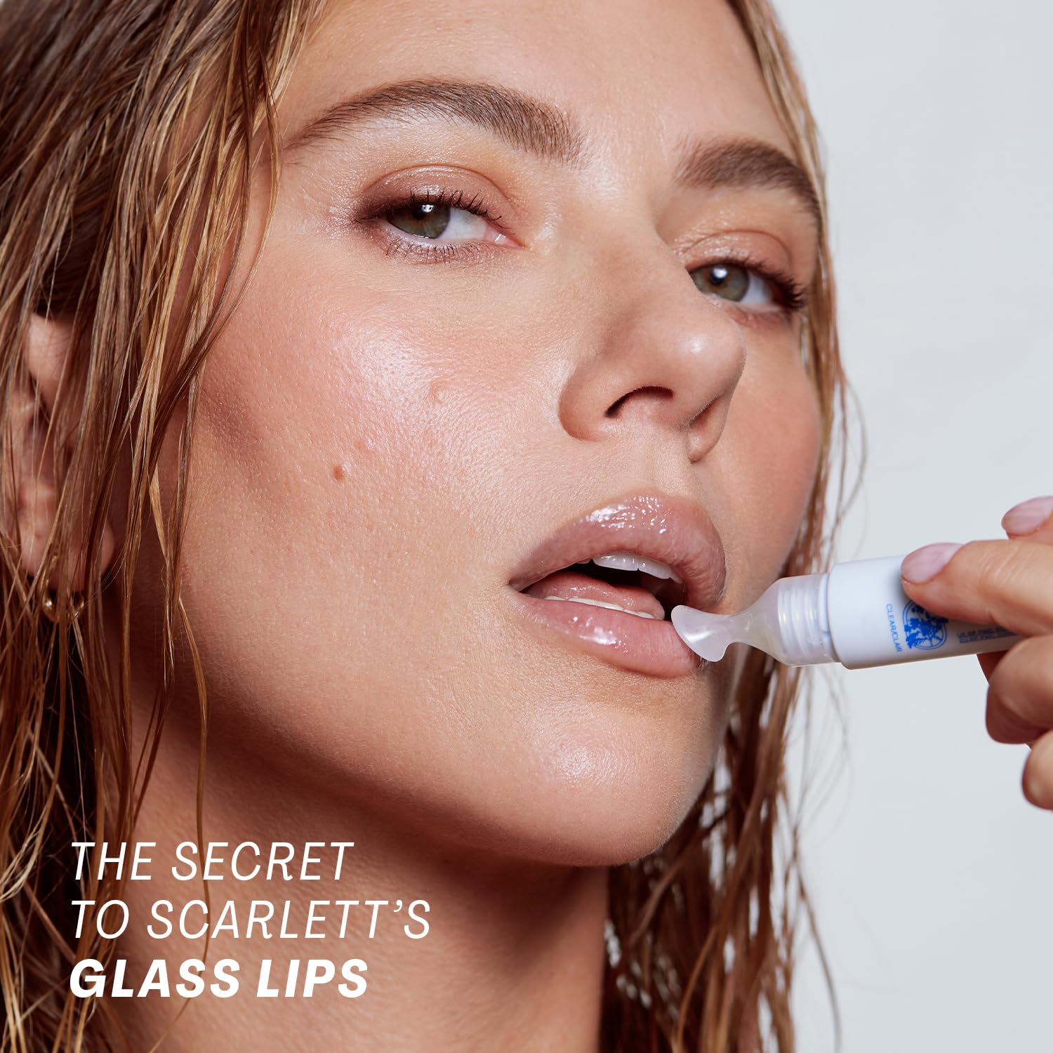Lip Oasis gloss closeup emphasizes cushiony texture and radiant shine.