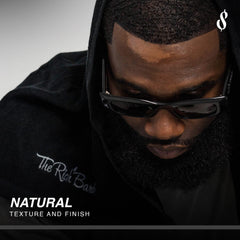 The Rich Barber N'Hance fiber close-up showing defined hairline