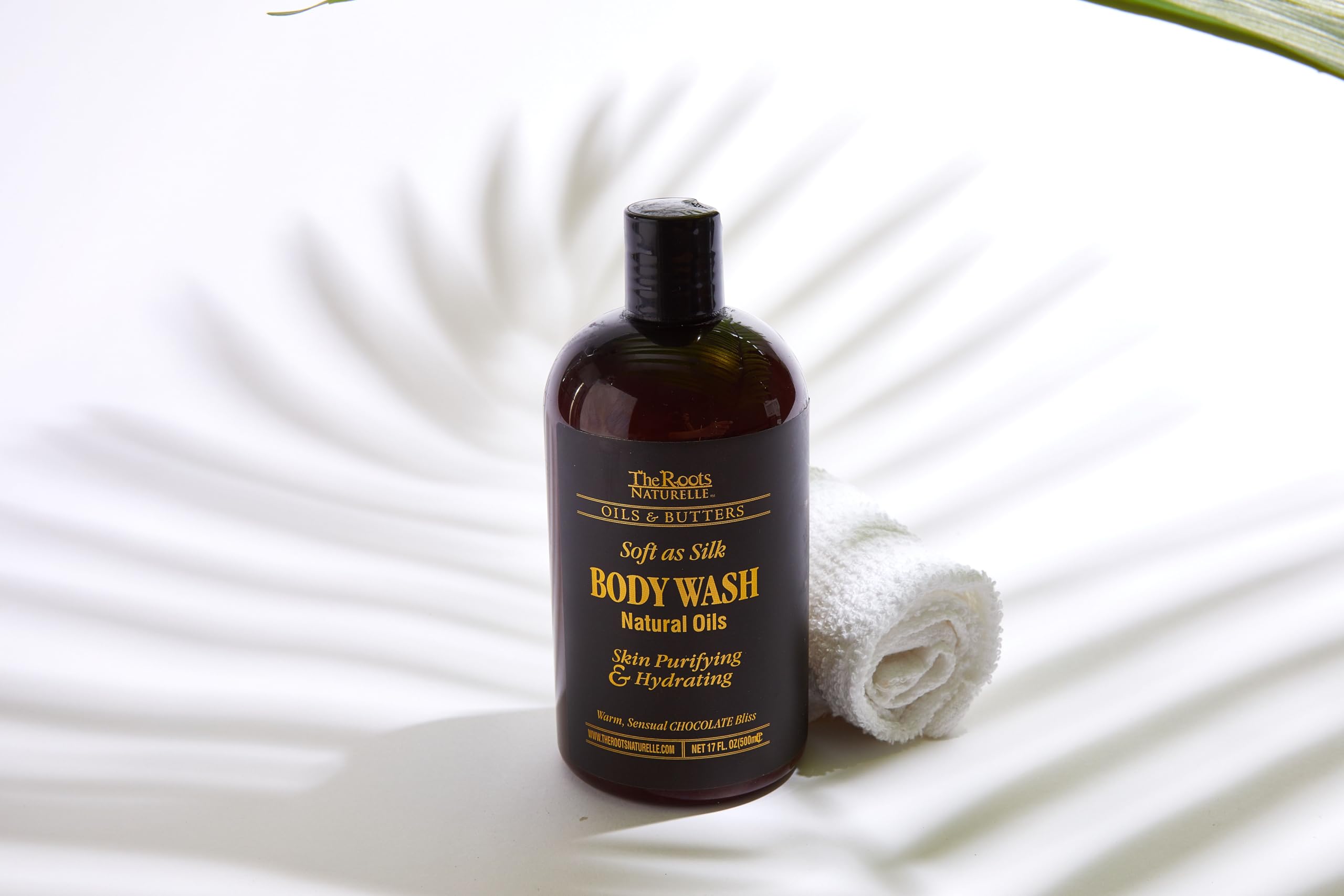 Close-up of ingredients shows organic oils and botanicals powering nourished skin.