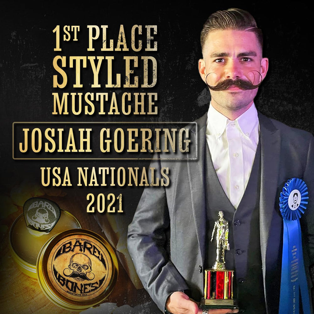 The Vintage Grooming Co Death Grip steel comb shown for precise moustache shaping.