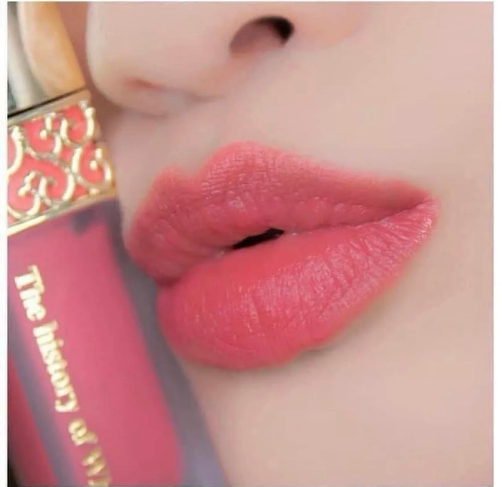 Product packaging featuring the Glow Lip Balm and pouch.